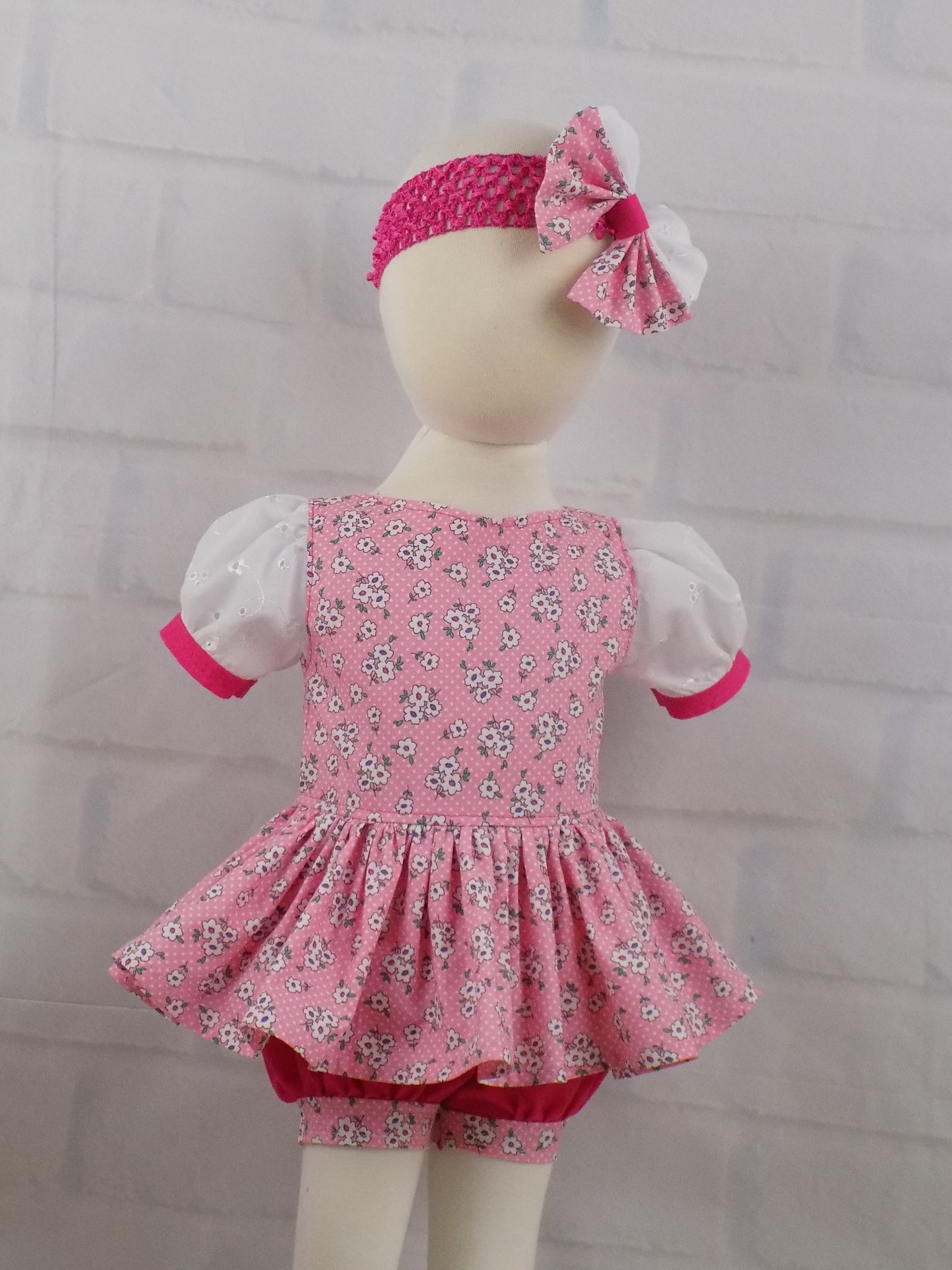 Ditzy Pink Floral and Eyelet Pageant Casual Wear Outfit. Top, Shorts, Suspender Skirt and Bow Set.