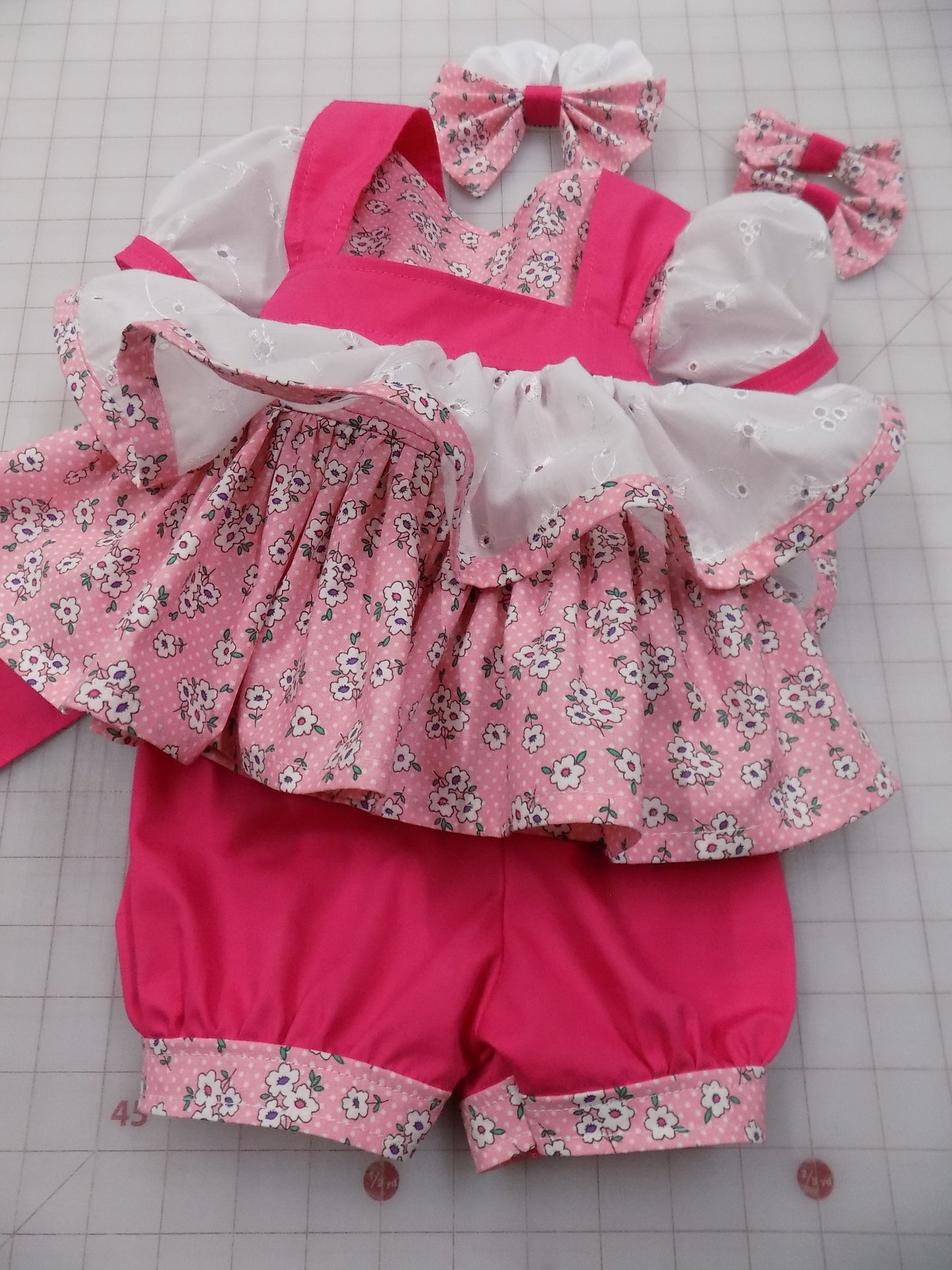 Ditzy Pink Floral and Eyelet Pageant Casual Wear Outfit. Top, Shorts, Suspender Skirt and Bow Set.