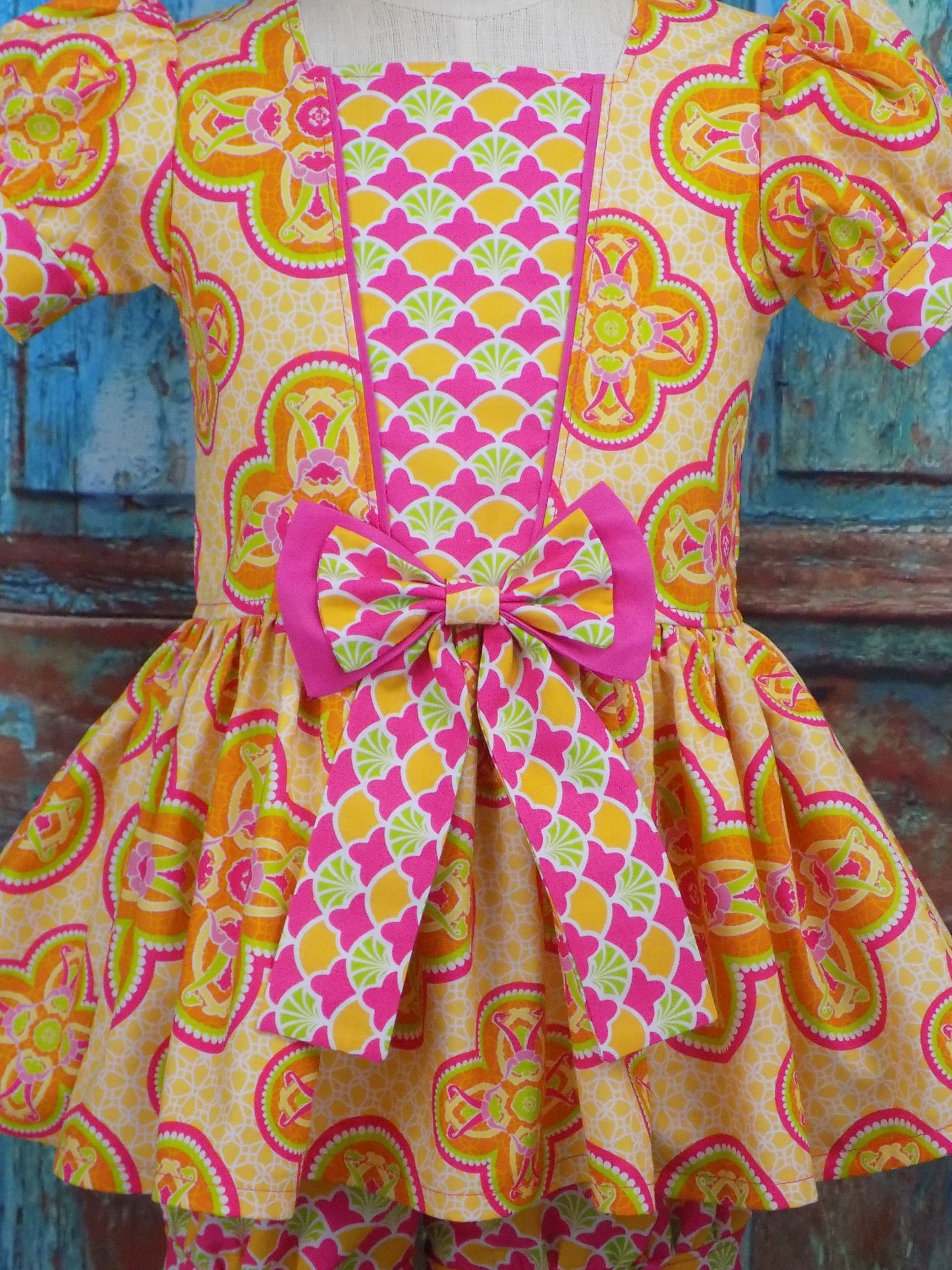 Neon Orange Yellow and Pink Medallion Pageant Casual Wear Outfit. Top Shorts Bow Sportswear Set