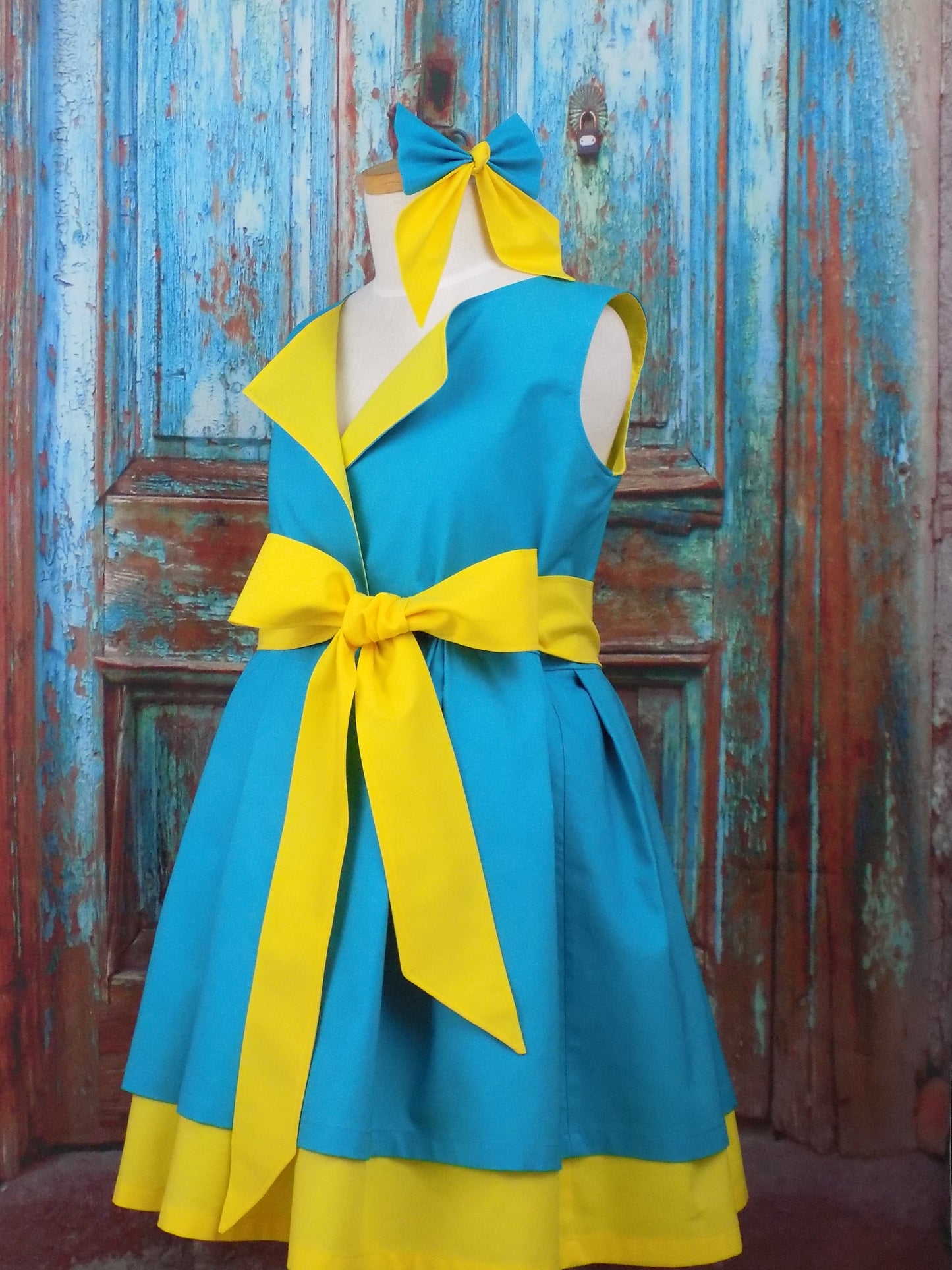 Girls Wrap Style Dress is Sleeveless and has a Waist Sash.  Perfect for Pageant Personality Wear or Interview