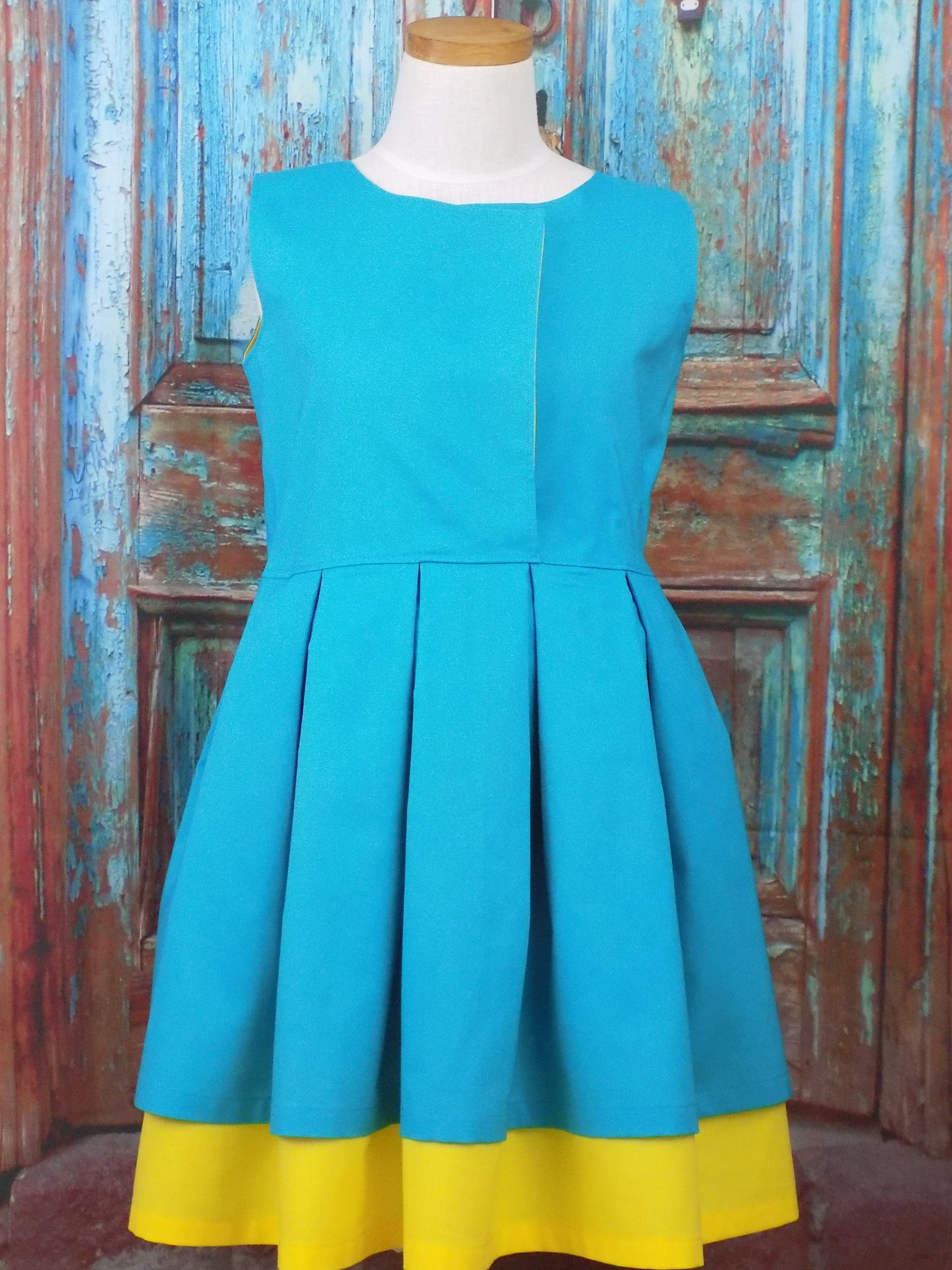 Girls Wrap Style Dress is Sleeveless and has a Waist Sash.  Perfect for Pageant Personality Wear or Interview